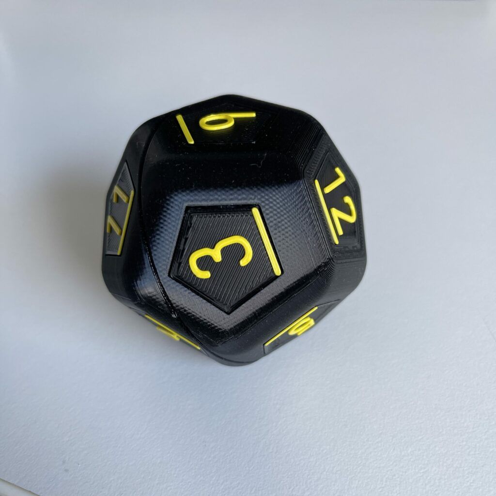 photo of the 12 sided dice labeled with normal font