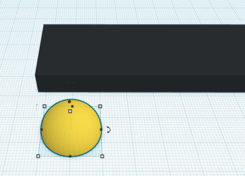 A hemisphere next to a cuboid on the draw area