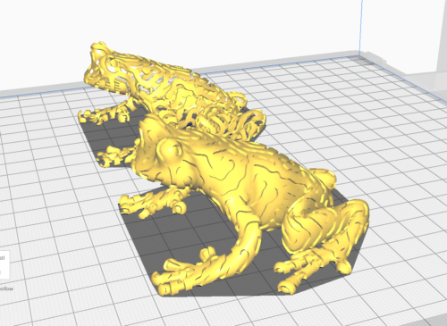 Screenshot of working with two submodes in the Cura Slicer. Two models are presented. One will eventually become the blue line of the frog, the other will become the yellow line of the frog. In this picture, however, they are both yellow.