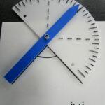 Protractor on a tactile drawing. The arm and base of the protractor forms the angle. The pointed end of the arm shows the angle measurement