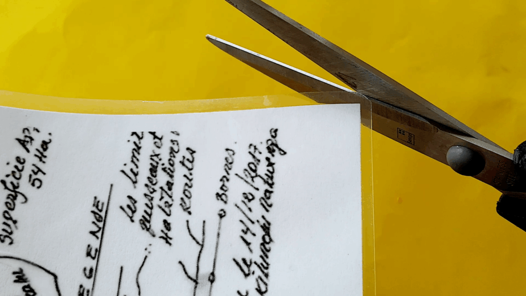 A scissor is used to shape sharp edges into round edges