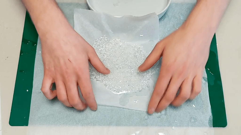 The granulates are taken out of the water an are now transparent.