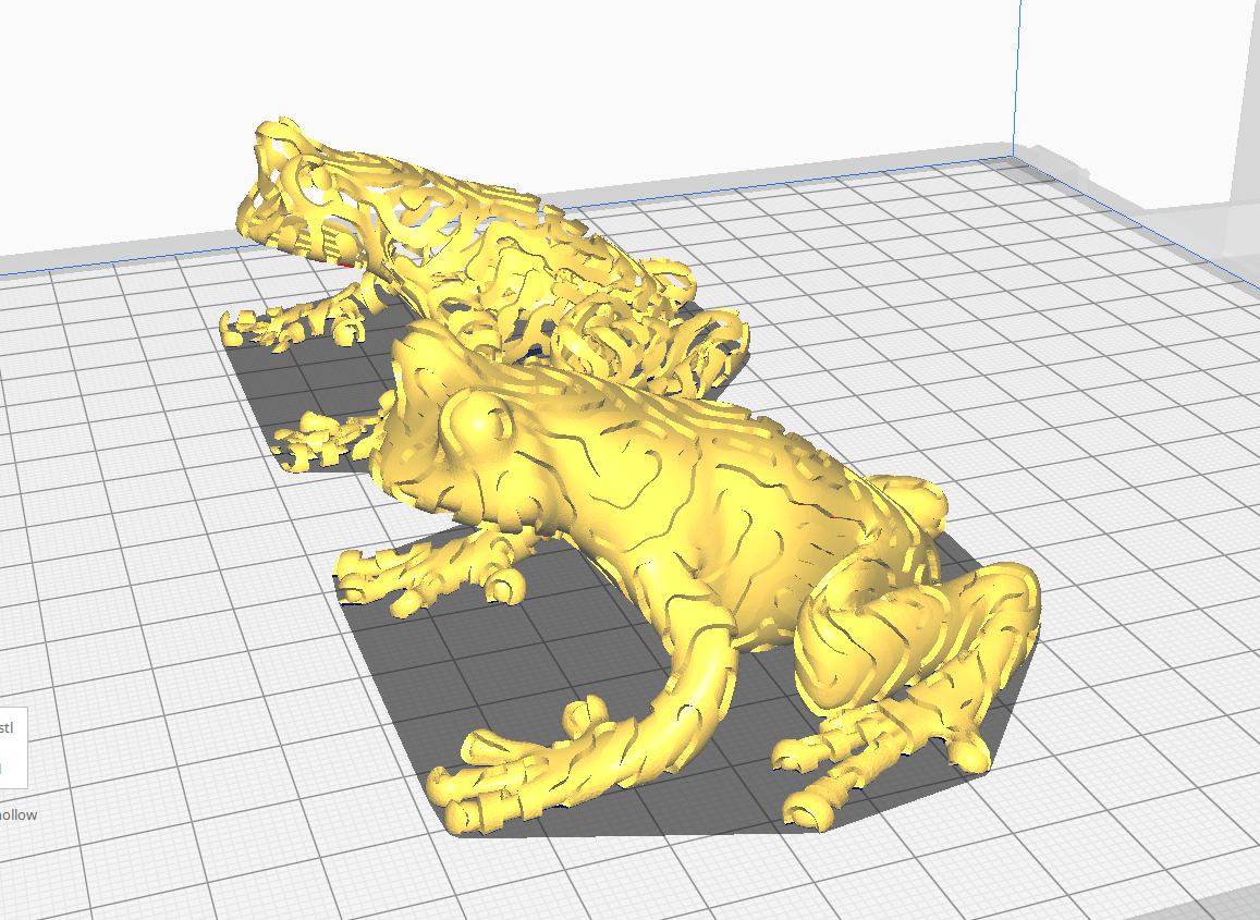Screenshot of working with two submodes in the Cura Slicer. Two models are presented. One will eventually become the blue line of the frog, the other will become the yellow line of the frog. In this picture, however, they are both yellow.