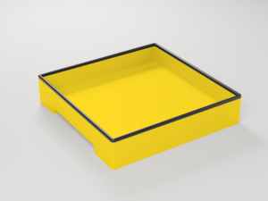 EN: Square yellow magnetic tray with black rim, shown at an angle. DE: Quadratische gelbe Magnetschale mit schwarzem Rand, schräg von oben.