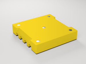 EN: Underside of the yellow pen holder with five embedded round magnets. DE: Unterseite des gelben Stifthalters mit fünf eingelassenen runden Magneten.